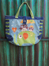 Women&#39;s bag with a colorful print, handmade from recycled denim in a patchwork s - £78.85 GBP