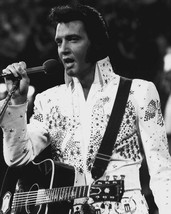 Framed Canvas Art Print Giclee elvis-presley-holds-the-microphone-while-singing - £31.54 GBP