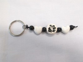 NEW BLACK &amp; WHITE CERAMIC PANDA DISC BEAD &amp; 2 WHITE HEART SHAPED BEADS K... - $9.75 CAD
