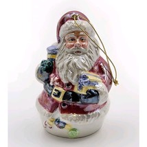 Vintage Iridescent Glazed Ceramic Santa with Presents Christmas Ornament - $244.36 MXN
