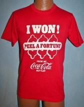 Vintage 80s COCA COLA Peel A Fortune Contest 50/50 T-SHIRT Coke Is It RA... - £15.81 GBP
