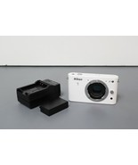 Nikon 1 J1 10.1 MP Mirrorless Digital Camera (Body Only) - White ISSUE - $67.90 CAD