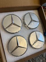Mercedes Benz Silver Floating Hub Caps NEW 75mm - $147.12 CAD