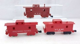 An item in the Toys & Hobbies category: 3 Marx Trains Caboose 1977 AT&SF, Southern Pacific & NYC O Gauge