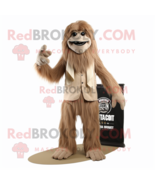 Tan Sasquatch mascot costume character dressed with a Tuxedo and Scarves - $1,209.00