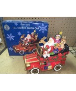 Trim A Home Fiber Optic 10in Lighted Santa Car - $1,250.56 MXN