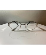 Unisex, silver framed eyeglasses with oval shaped clear lenses - $10.00