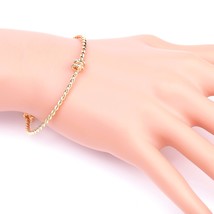 Rose Gold Tone Twisted Bangle Bracelet With Trendy Knot Design - £19.28 GBP