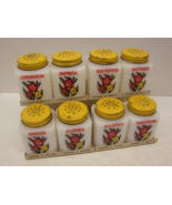 Vintage Tipp USA flower spice set yellow lids and metal rack 8 piece mil... - $149.00