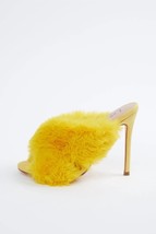 Firebody faux-fur vegetarian suede mules in Yellow - £187.46 GBP