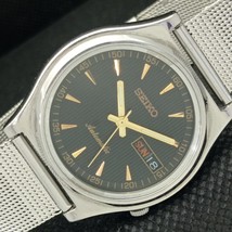 VINTAGE SEIKO 5 AUTOMATIC 7019A JAPAN MENS DAY/DATE BLACK WATCH 593a-a31... - $39.99