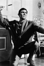 George Lazenby as 007 On Her Majesty&#39;s Secret Service throws knife 8x12 photo - £12.78 GBP