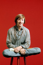 Peter Tork in The Monkees sitting cross legged on stool 24x36 Poster - £25.75 GBP