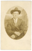 Antique Rppc Of Man In Suit And Tie With Arms Crossed Wearing Hat - £7.46 GBP