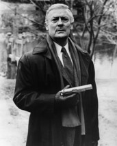 Edward Woodward in The Equalizer as Robert McCall in Black Raincoat Holding Gun  - $69.99