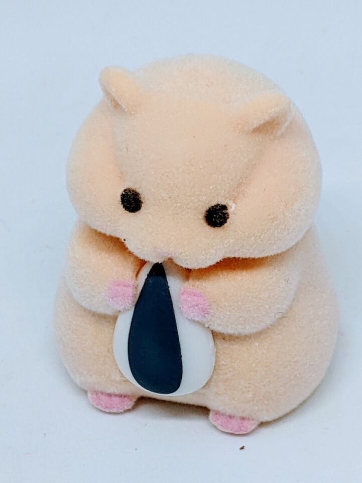 Yellow Hamster With Melon Seed Figurine - $20.00