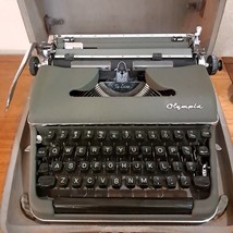 Vintage Olympia De Luxe SM3 Portable Manual Typewriter 1957 olive green ... - $683.16 CAD