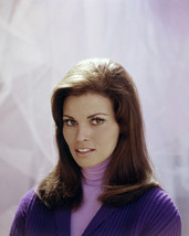 Raquel Welch 16x20 Poster in purple sweater - £15.72 GBP