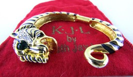 Kenneth Jay Lane, Gold and Black Tiger Head and Tail Ribbed Bracelet Spring Back - $166.50