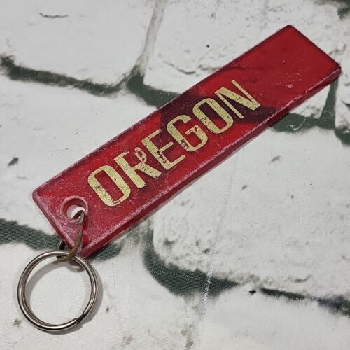 Primary image for Vtg Distressesd OREGON Keychain Red Plastic Gold Print 