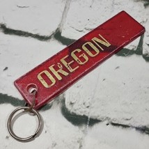 Vtg Distressesd OREGON Keychain Red Plastic Gold Print  - $11.88