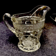 Vintage Creamer With Flower Design And Sawtooth Edge - $5.94