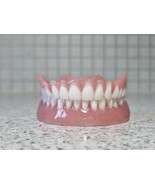 Full upper and lower dentures/false teeth, Brand new. - $135.00