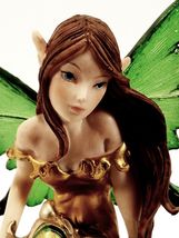 Green Fairy Pixie Sitting on Forest Lilly / Green Winged Fantasy Figurine - $27.72