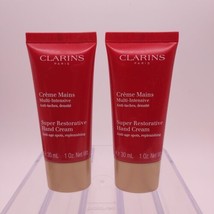 LOT OF 2 Clarins Anti-Aging Multi-Intensive Super Restorative Hand Cream 1oz ea - £13.71 GBP