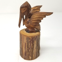 Pelican Figurine Wood Hand Carved Wings Spread Sitting on Stump Brown Vtg - $18.95