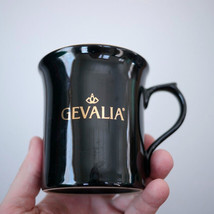 Vintage GEVALIA Logo Gourmet Glossy Black Gold Porcelain Coffee Tea Mug - $19.99