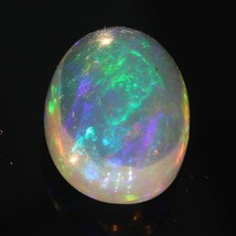 Welo Opal Oval Ethiopian Wollo Water Clear Base Rolling Play of Color 5.81 carat - £152.04 GBP