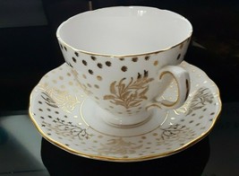 Vintage elegant porcelain coffee cup and saucer in white with gold pattern - £15.56 GBP