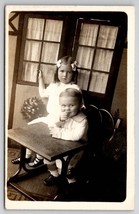 RPPC Adorable Girl Hair Bows Little Boy Antique School Desk Postcard F24 - £11.15 GBP