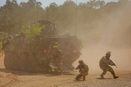 US Army soldiers conduct an attack demonstration at Fort Benning Photo Print - $8.81+