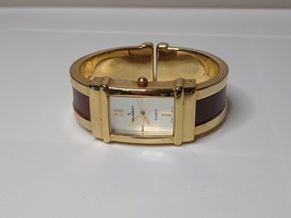 Peugeot Gold Tone And Brown Watch PQ8110 - $35.00