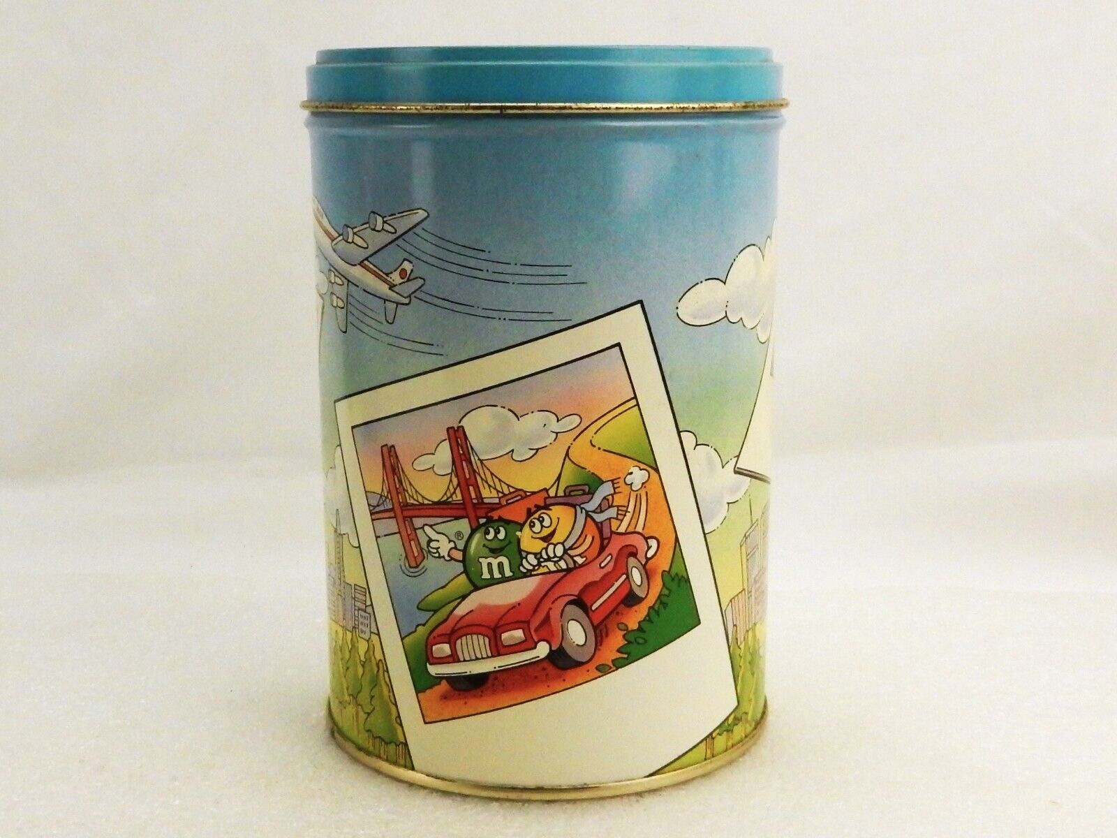 Plain M&amp;Ms Blue Metal Canister, Vintage Graphics, Vacation/Travel Theme - $14.65