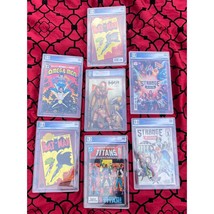 7 PGX Slabs, inc Strange Academy 9.8s and a 10.0 Gem Mint Ebas #12/15 HI... - $791.99