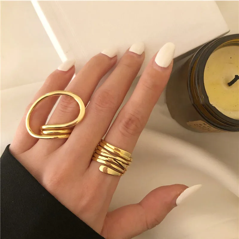 Llow out geometry irregular distortion multilayer cross twist metal ring for women thumb155 crop