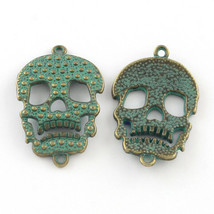 2 Skull Charms Antiqued Bronze Patina Pendants Gothic Halloween Verdigris Green - £3.18 GBP