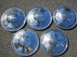 Genuine 1973 to 1976 Plymouth Duster Valiant 14 inch hubcaps wheel covers - $55.75
