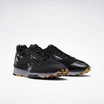 Reebok Unisex Adults Jurassic World LX 2200 Sneaker Core Black/ Gold/ Shadow - £130.17 GBP+
