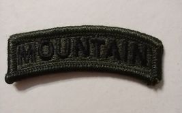 MOUNTAIN TAB PATCH SUBDUED COLOR BLACK ON OLIVE NOS - $2.97