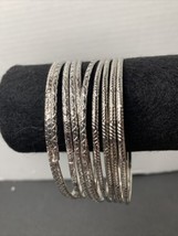 Lot Of Ten 10 Bangle Bracelets Silver Tone With 4 Patterns Costume Pieces - £4.02 GBP