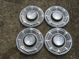 Genuine 1970 to 1977 Ford Maverick 14 inch hubcaps wheel covers - $46.40