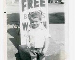 Little Boy in Front of Free Benrus Watch Each Month Sign at Gas Station ... - $17.82