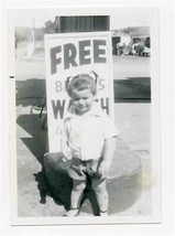 Little Boy in Front of Free Benrus Watch Each Month Sign at Gas Station Photo - £14.01 GBP
