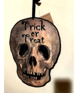 Trick or Treat Skull Head Wall Plaque in distressed finish - $51.74 CAD