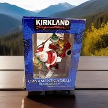 Santa Claus on a Tricycle with Toys Ornament By Kirkland Signature  - $184.88 MXN