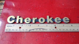 Oem 1984-1989 Jeep Cherokee fender Emblem Badge Nameplate used GOLD TONE - $10.12
